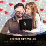 Couple exchanging gifts, cocktail smoker kit present.