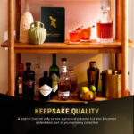 Whiskey shelf with bottles and cocktail journal