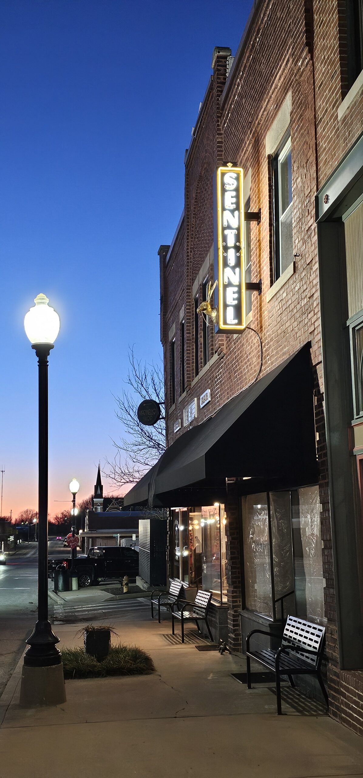 Street scene with building at sunset